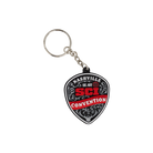 A novelty guitar-pick-shaped keychain featuring the 'Nashville SCI Convention 2025' logo in red and white on a black background, complete with a silver split key ring and chain.